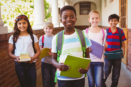 Students Smiling in a Hall